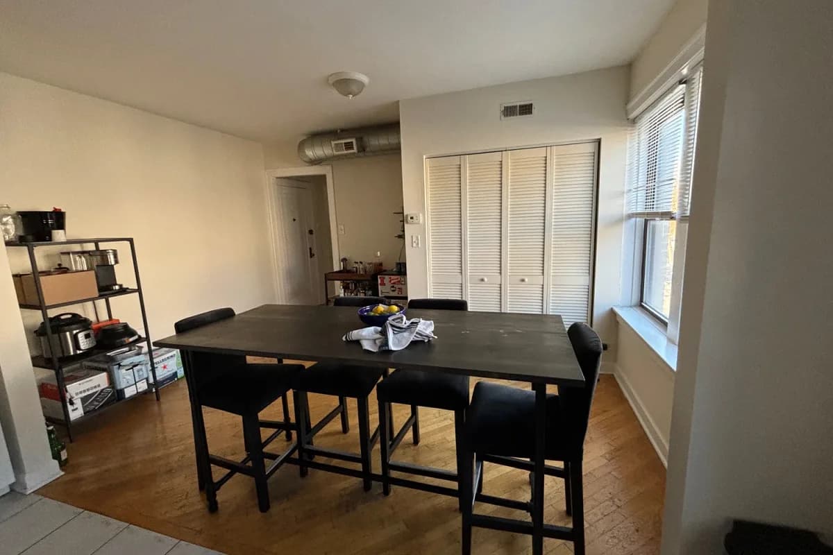 3325 N. Lakewood Ave, Apt 2 — dining area with louvered storage closet