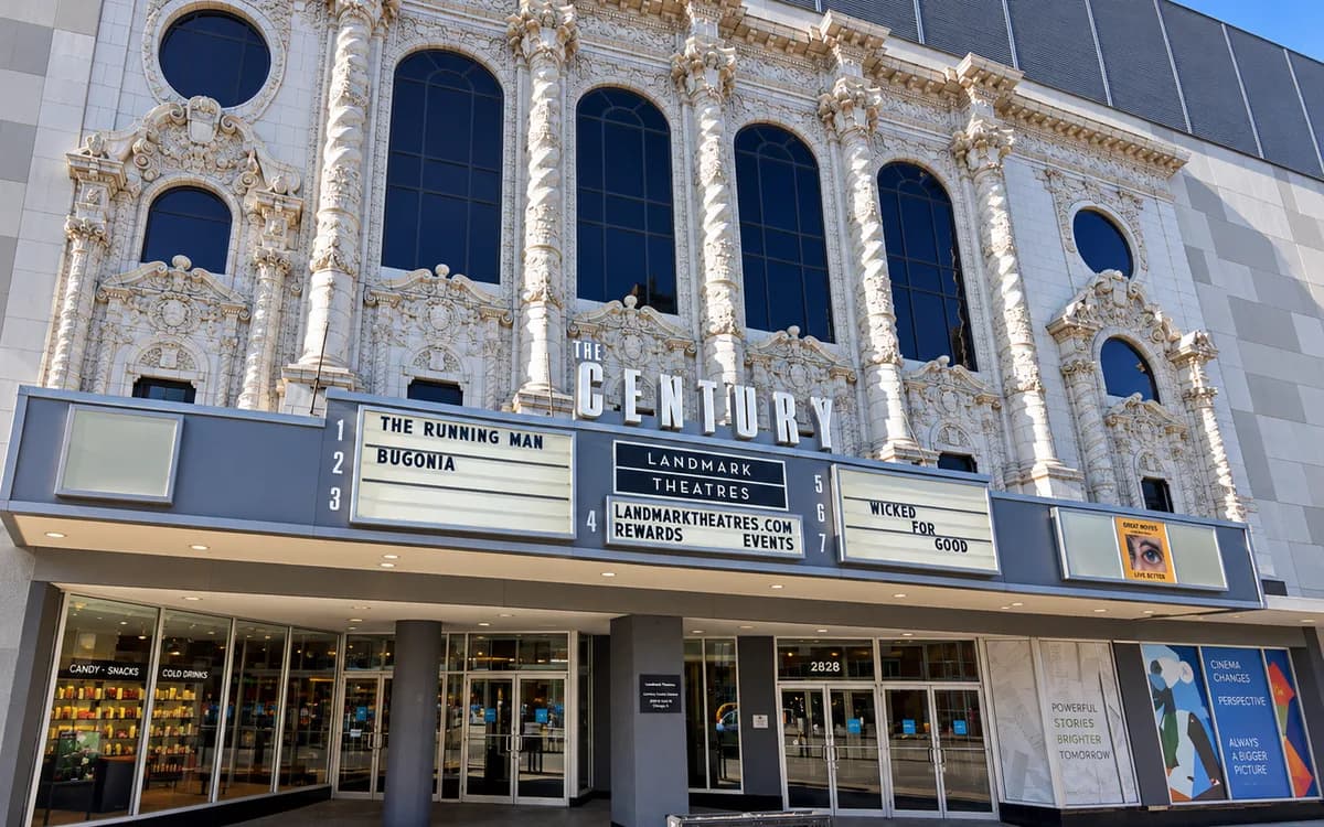 The ornate terra cotta facade of The Century building with the Landmark Theatres marquee at street level